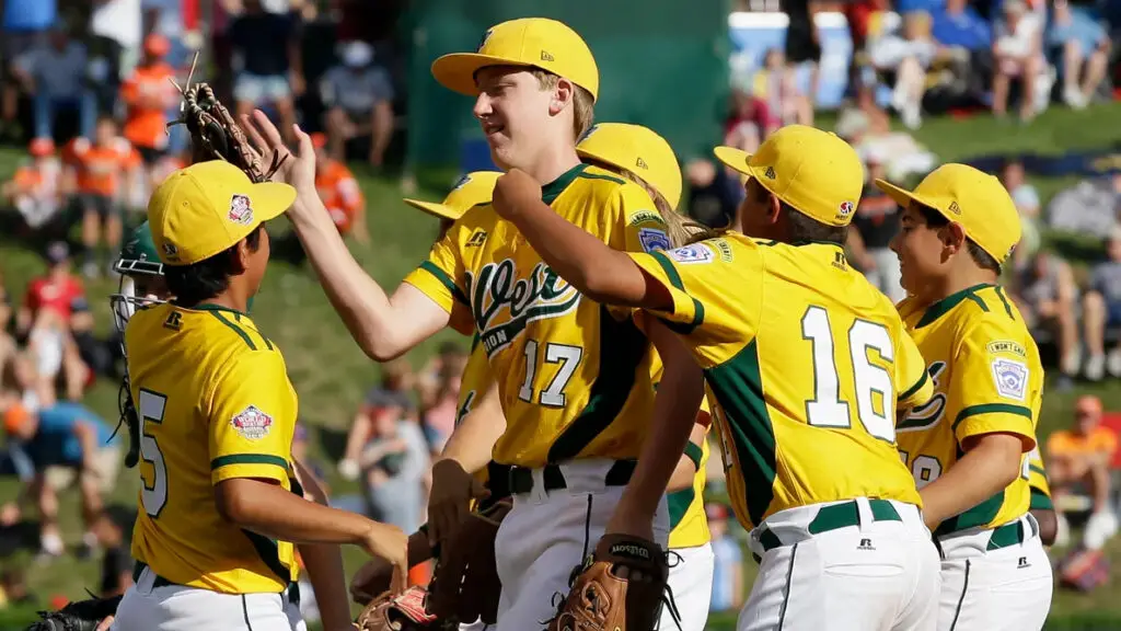 Chula Vista, California pitcher Grant Holman celebrates with his teammates after throwing a no-hitter against Grosse Pointe, Michigan in the 2013 Little League World Series