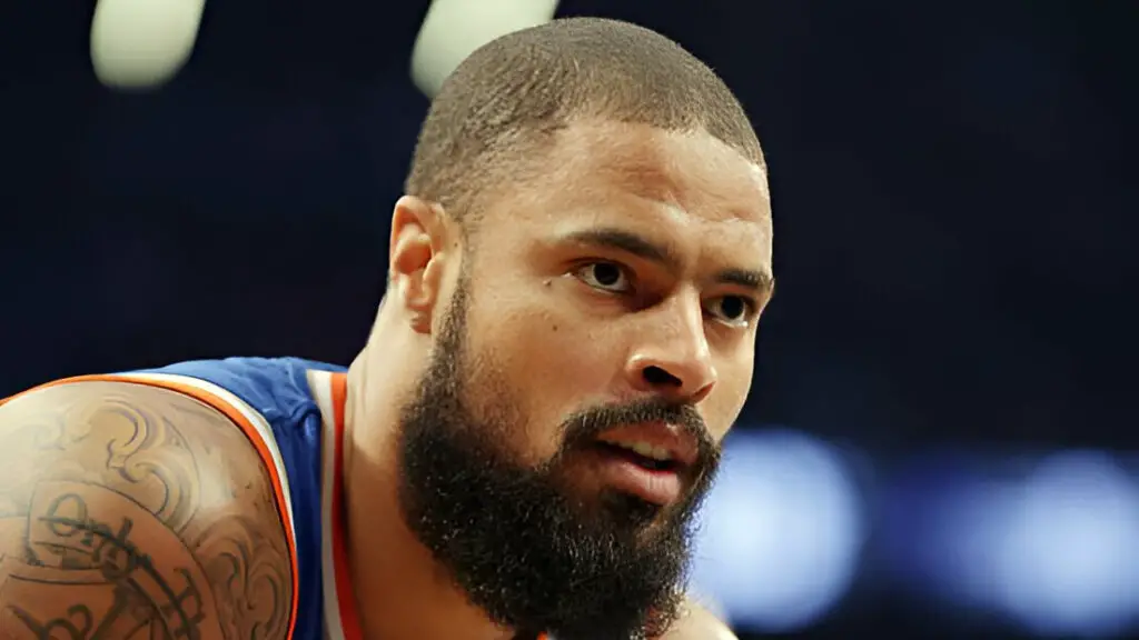 Former New York Knicks center Tyson Chandler waits for play to begin against the Brooklyn Nets