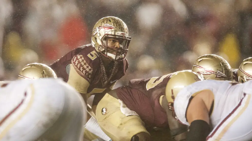 Former Florida State Seminoles quarterback Jameis Winston waits for the snap against the Boston College Eagles in the rain