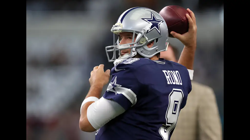 Dallas Cowboys quarterback Tony Romo warms up on the field before the game against the Washington Redskins