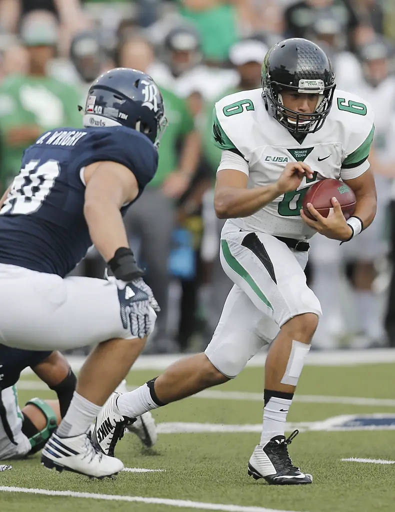 Mason Fine rushing against the Rice Owls (Getty Images)