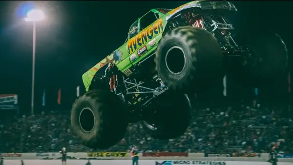 Avenger Monster Truck driver Jim Koehler doing a jump at the thrill show