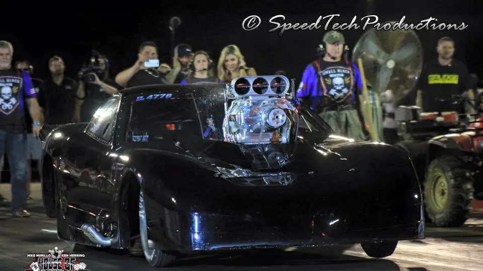 Former Street Outlaws cast member Todd Skelton making a pass on the street