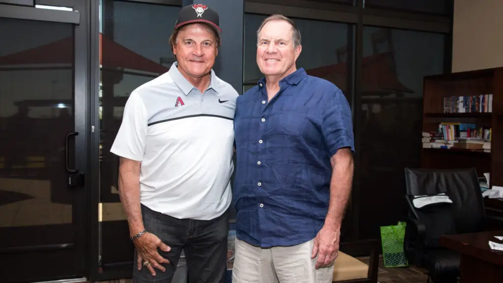 Arizona Diamondbacks Front Office executive Tony La Russa poses for a photo with New England Patriots head coach Bill Belichick