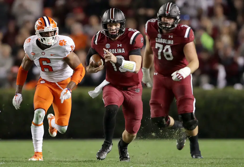 South Carolina quarterback Jake Bentley is seen here rushing the ball against the Clemson Tigers (Getty Images)