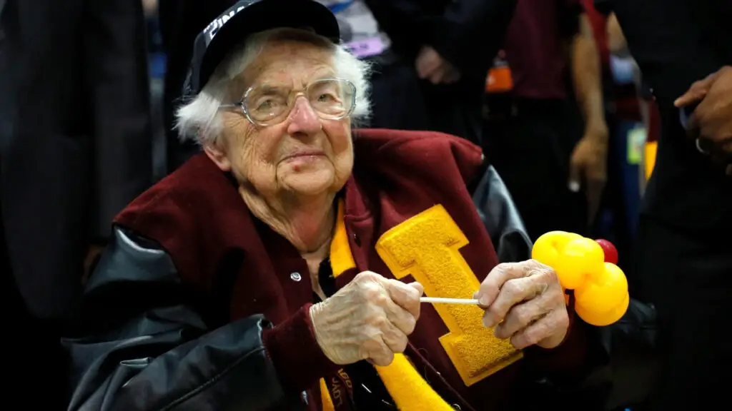 Sister Jean Dolores Schmidt celebrates with the Loyola Ramblers after defeating the Kansas State Wildcats during the 2018 NCAA Men's Basketball Tournament South Regional