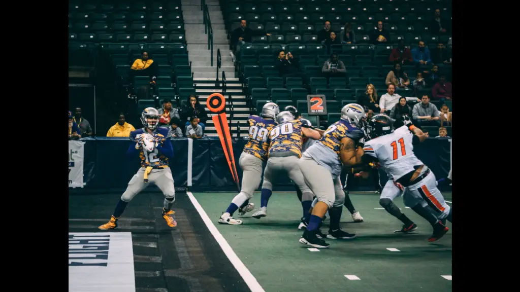 Jersey Flight quarterback Steve Panasuk looking to pass the ball against the Maryland Warriors