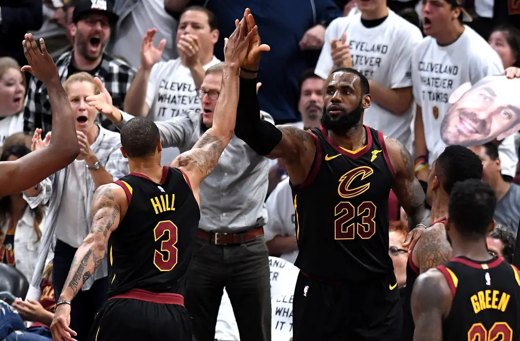 LeBron James and George Hill react after a second-half play in Game 6 (Getty Images)