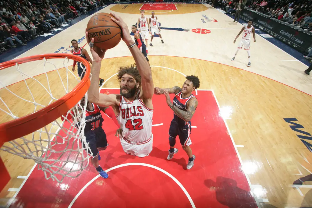 Robin Lopez goes flying, as he looks to throw down a dunk