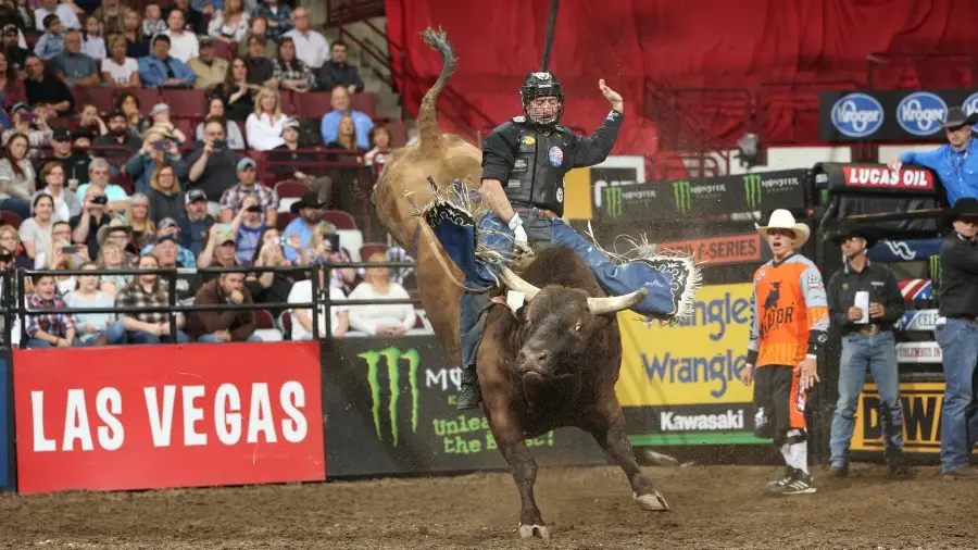 Former Professional Bull Rider Sean Willingham riding a bull during one of the PBR events