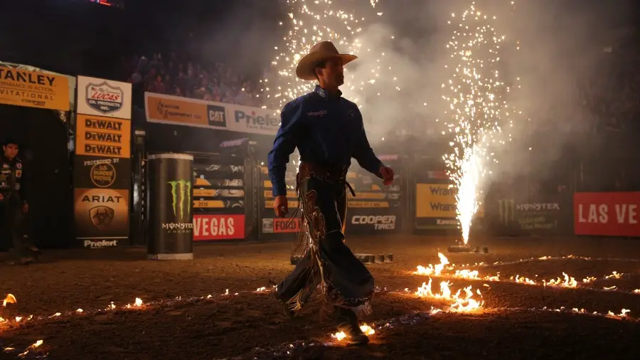 Professional Bull Rider Sean Willingham walking out to the crowd before a PBR event