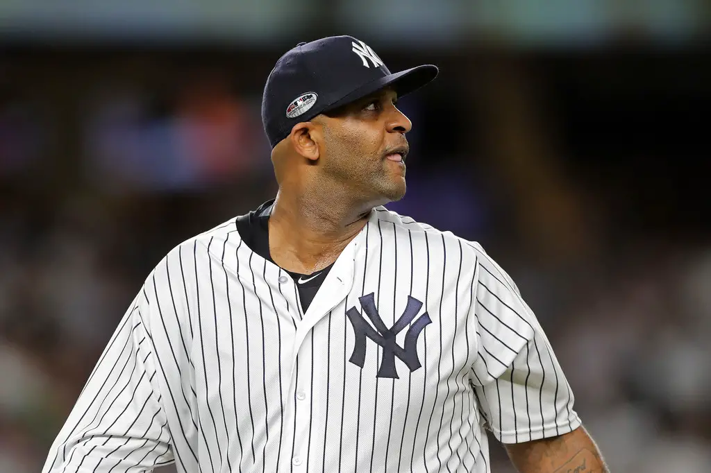 New York Yankees pitcher C.C. Sabathia walking to the dug out after giving up three runs