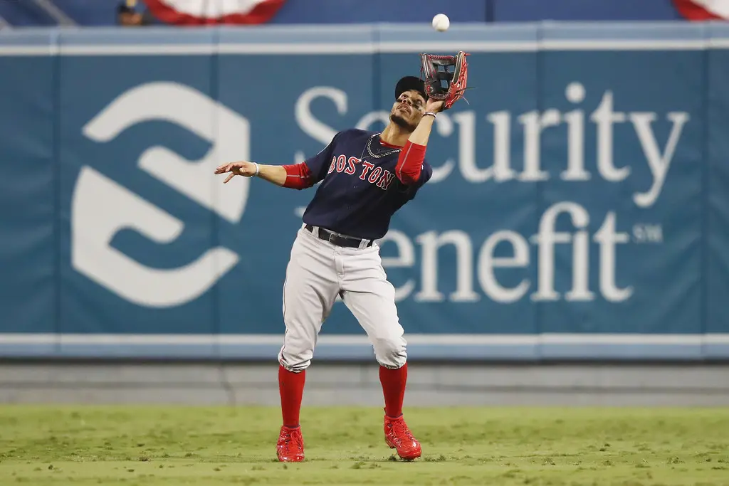 Boston Red Sox outfielder Mookie Betts catches an out against the Los Angeles Dodgers in the World Series 