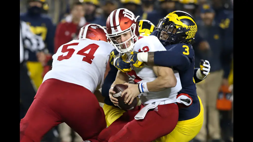 Michigan Wolverines star defensive lineman Rashan Gary sacks Indiana Hoosiers quarterback Peyton Ramsey during a game between the Indiana Hoosiers and the Michigan Wolverines