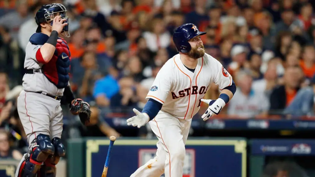 Houston Astros catcher Brian McCann flies out in the sixth inning against the Boston Red Sox during Game Three of the American League Championship Series