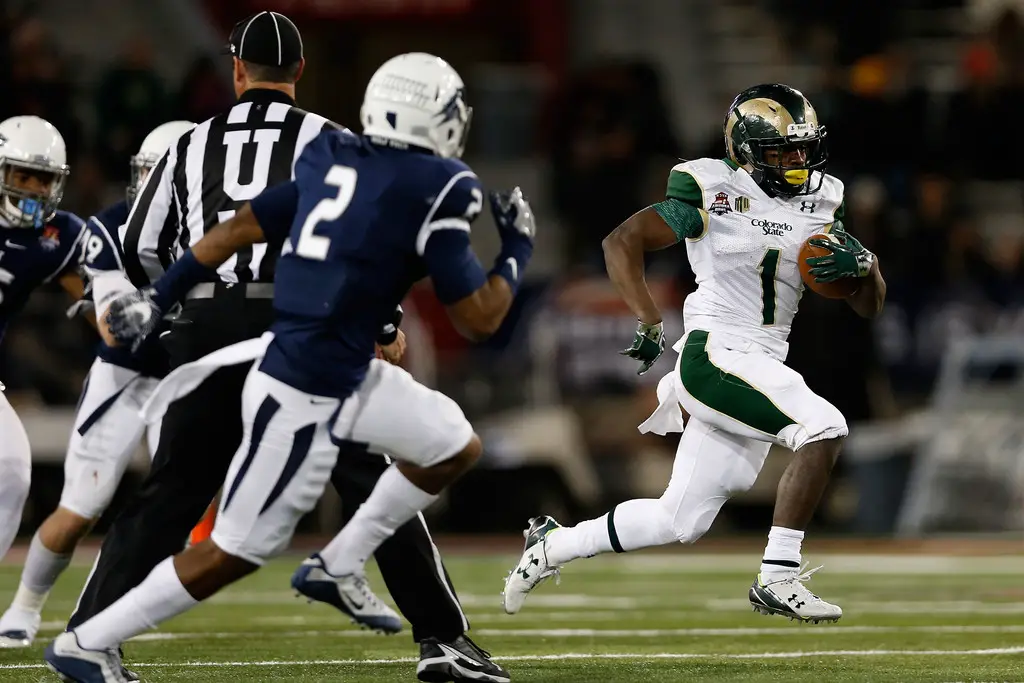 Colorado State Rams running back Dalyn Dawkins rushes with the ball against the Nevada Wolf Pack in the NOVA Home Loans Arizona Bowl