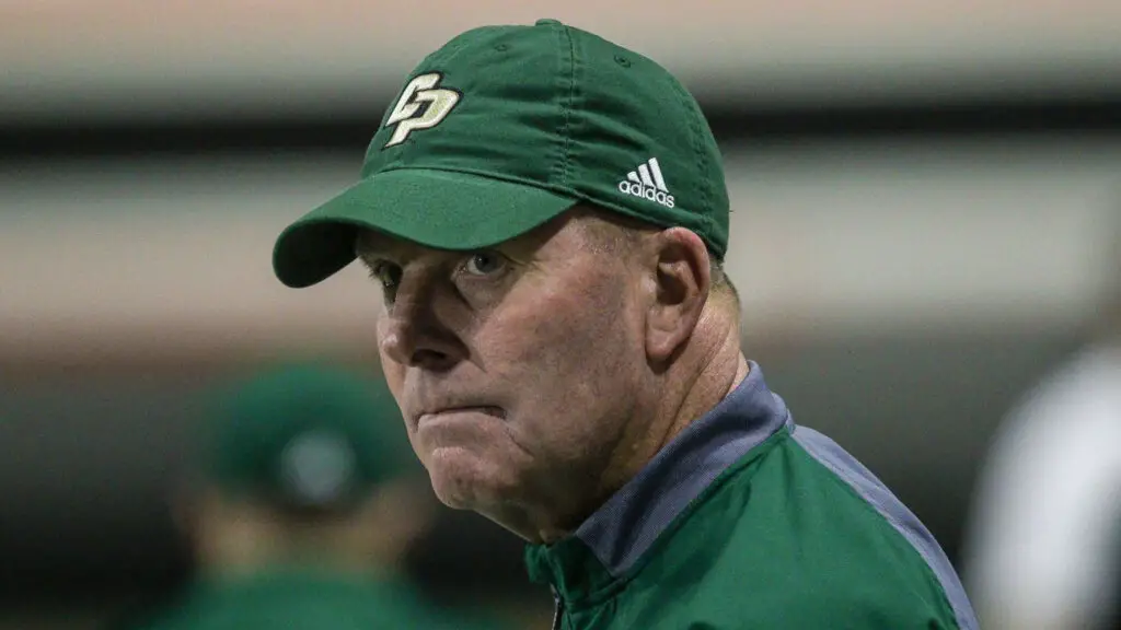 Former Cal Poly Mustangs head coach Tim Walsh looks for answers during second half action against the Idaho State Bengals