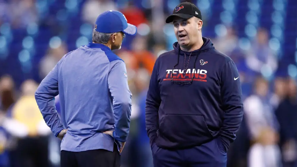 Former Houston Texans head coach Bill O’Brien speaking with Indianapolis Colts head coach Chuck Pagano prior to their teams game