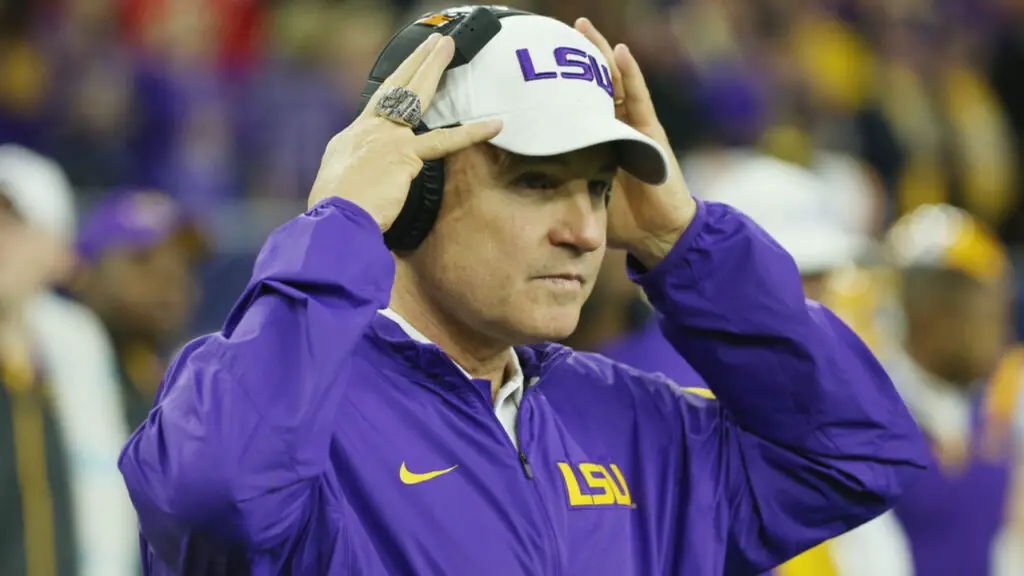 Former Kansas Jayhawks head coach Les Miles seen here as the LSU Tigers head coach before the start of the 2015 AdvoCare V100 Texas Bowl against the Texas Tech Red Raiders