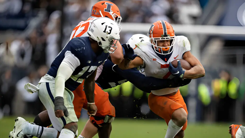 Illinois Fighting Illini running back Chase Brown carries the ball against the Penn State Nittany Lions