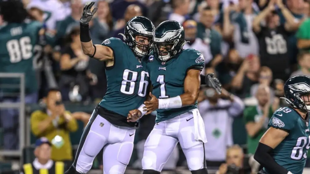 Former Philadelphia Eagles tight end Zach Ertz celebrates with Jalen Hurts after scoring a touchdown against the Tampa Bay Buccaneers