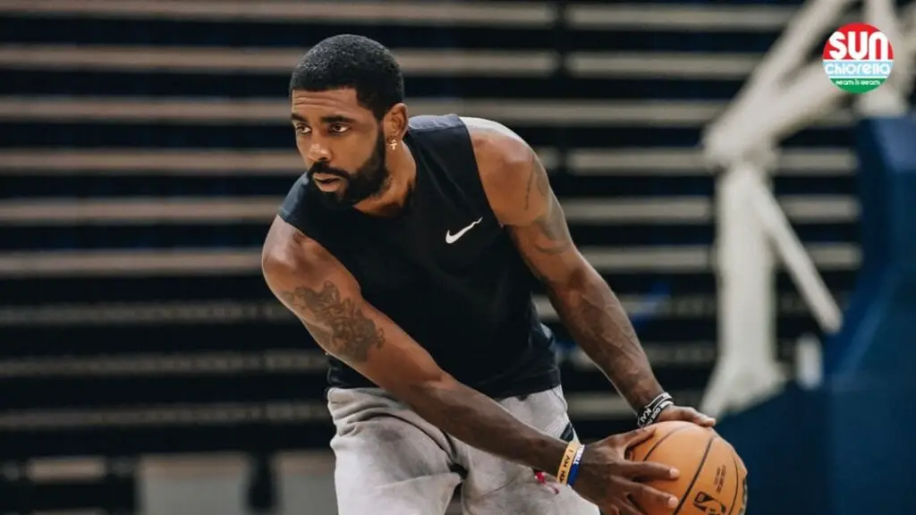 Brooklyn Nets star Kyrie Irving practicing with his teammates during training camp