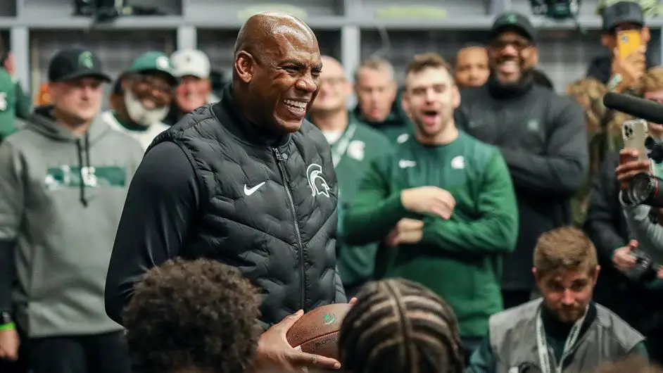 Michigan State Spartans head coach Mel Tucker is all smiles in the locker room following a win over the Michigan Wolverines