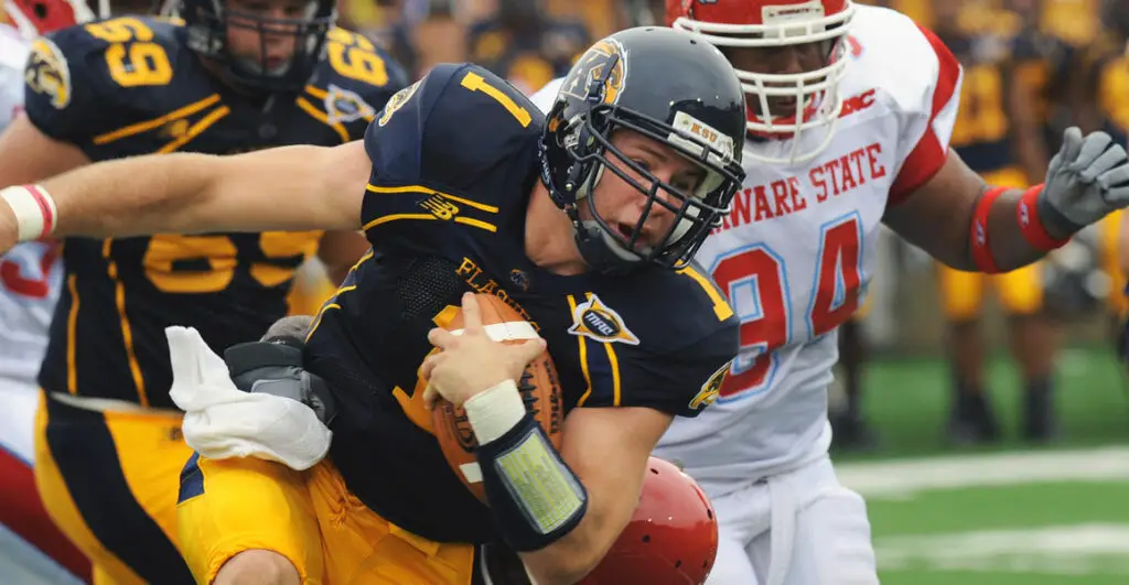 Former Kent State Golden Flashes quarterback Julian Edelman carries the football against the Delaware State Hornets