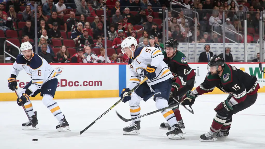Former Buffalo Sabres star Jack Eichel skates with the puck against the Arizona Coyotes