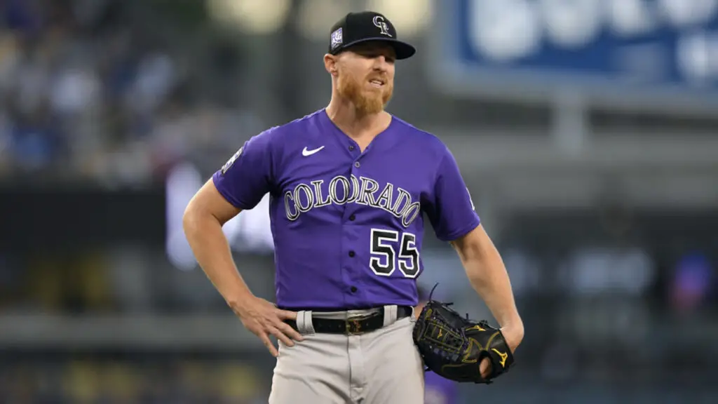 Pitcher Jon Gray grimaces in pain before being replaced by the Colorado Rockies against the Los Angeles Dodgers
