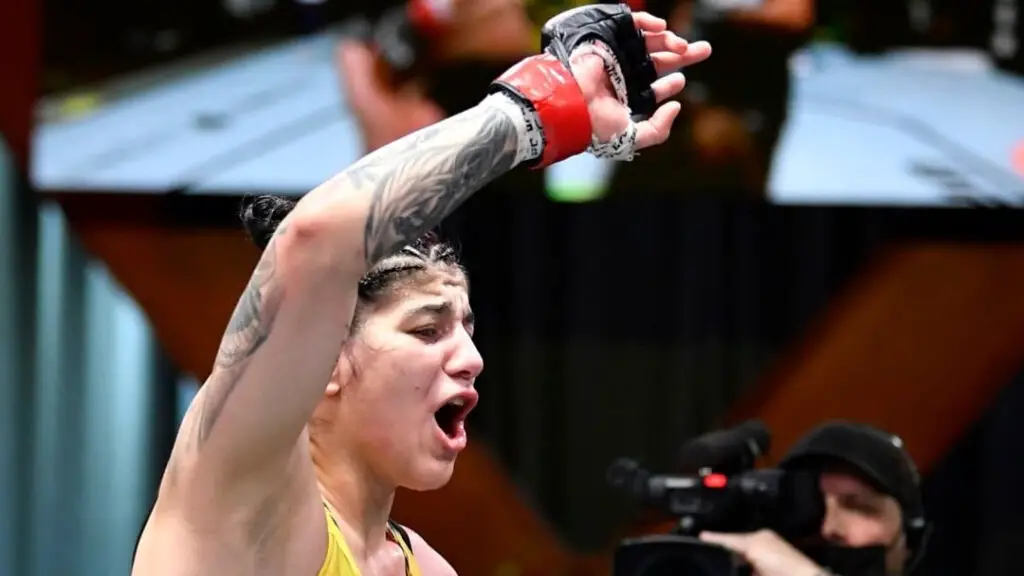 Kelten Vieira celebrates after her win over Miesha Tate at UFC Fight Night 198