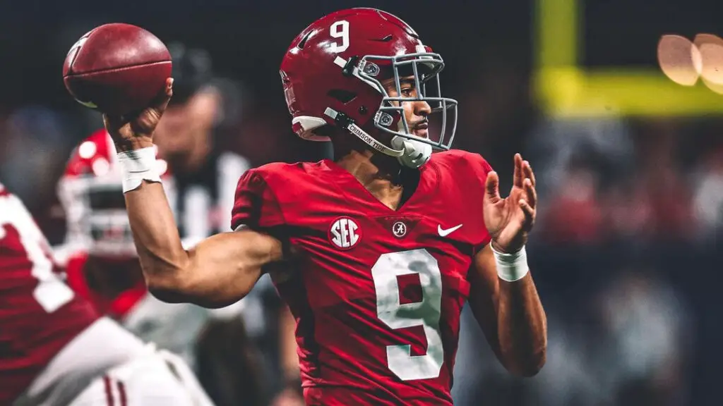 Alabama Crimson Tide quarterback Bryce Young attempts to throw a pass against the Georgia Bulldogs in the 2021 SEC Championship game