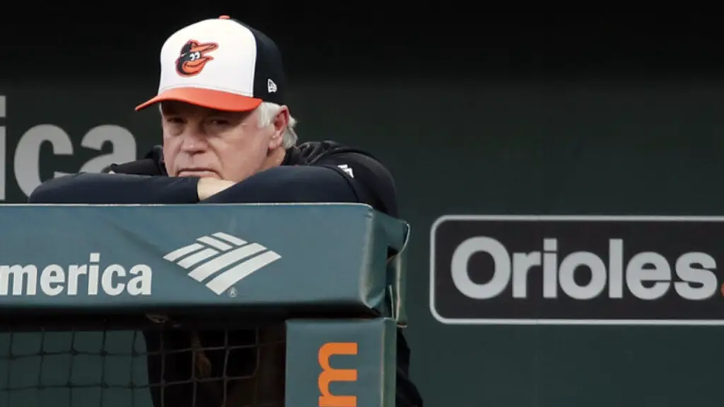 Former Baltimore Orioles manager Buck Showalter looks on from the dugout against the Houston Astros