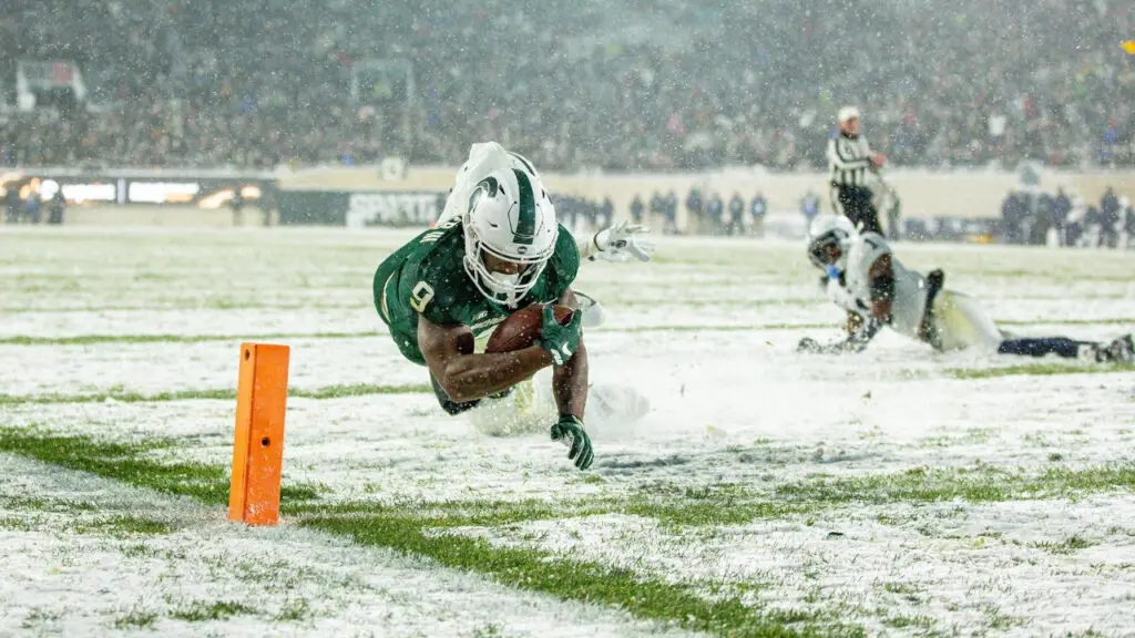 Former Michigan State Spartans running back Kenneth Walker III scores a touchdown against the Penn State Nittany Lions