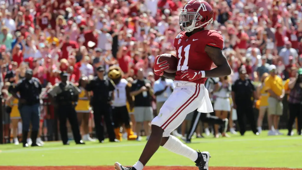 Former Alabama Crimson Tide wide receiver Henry Ruggs III scores a touchdown against the Southern Mississippi Golden Eagles