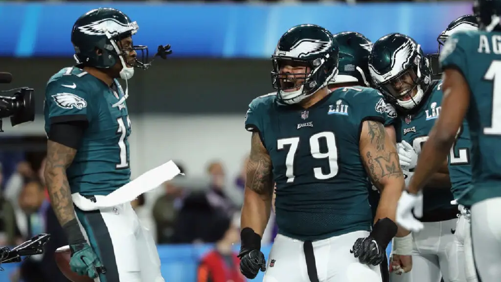 Former Philadelphia Eagles guard Brandon Brooks celebrates with Alshon Jeffrey following a 34-yard touchdown reception by Jeffrey in Super Bowl LII against the New England Patriots