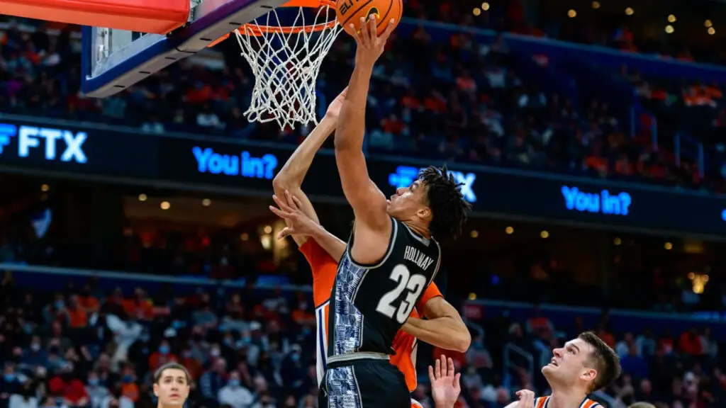 Georgetown Hoyas forward Collin Holloway attempts to make a layup against the Syracuse Orange
