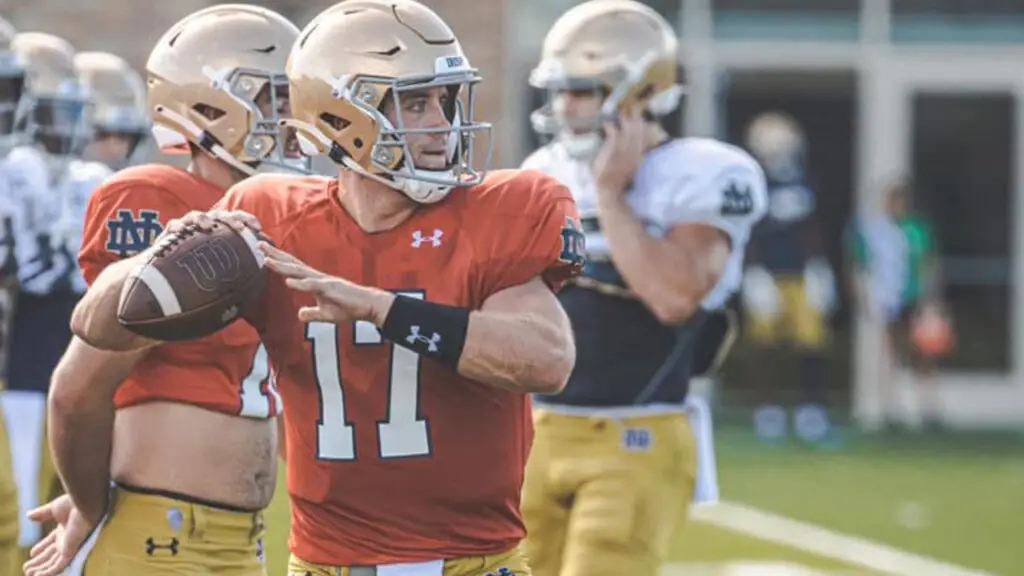 Notre Dame Fighting Irish quarterback Jack Coan attempts a pass during practice before the season