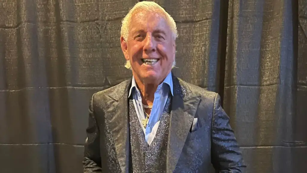 Wrestling icon Ric Flair seen during happier times as he is smiling during an event