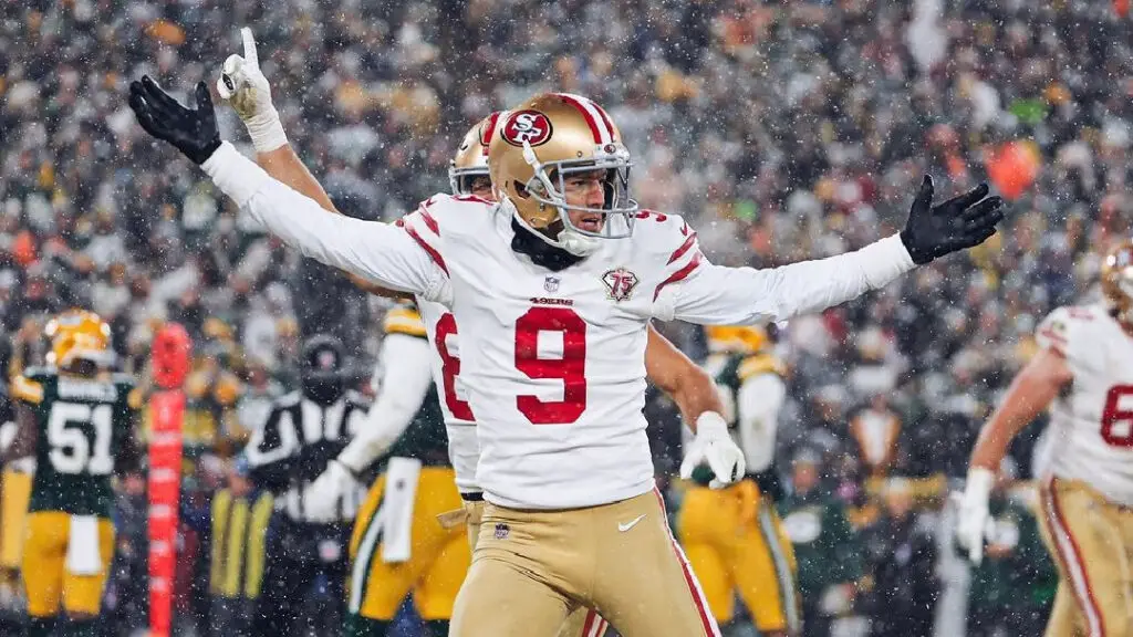 San Francisco 49ers kicker Robbie Gould celebrates after kicking the game-winning field goal against the Green Bay Packers