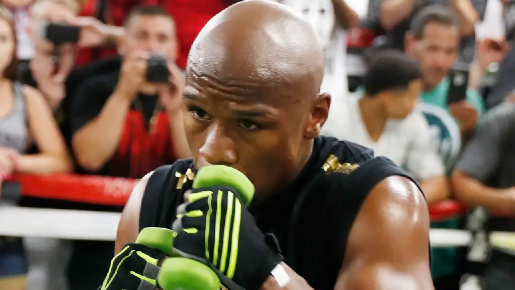 Former boxer Floyd Mayweather Jr. holds a media workout at the Mayweather Boxing Club before his mega-fight with Conor McGregor