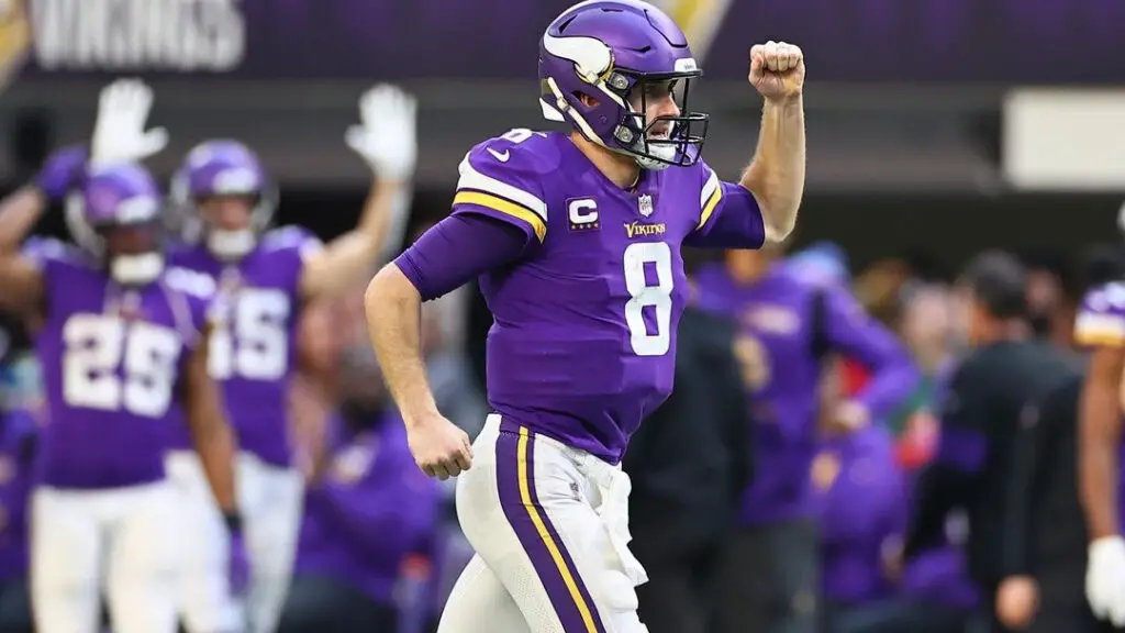 Minnesota Vikings quarterback Kirk Cousins celebrates after a touchdown