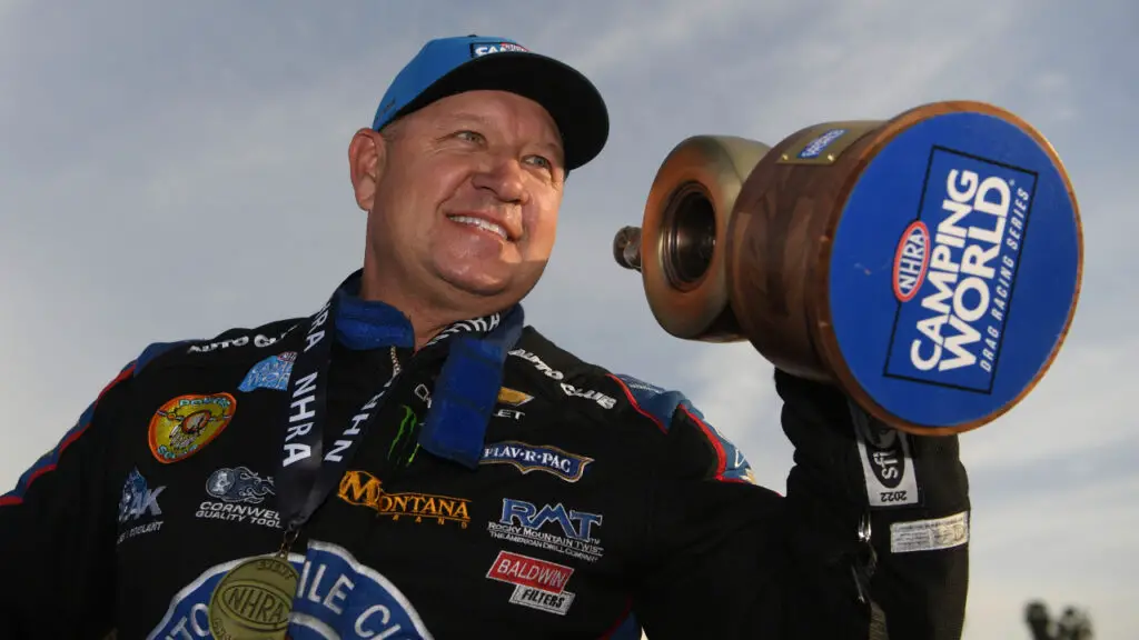 John Force Racing driver Robert Hight celebrates with the Wally after defeating Ron Capps to win the 62nd annual Lucas Oil NHRA Winternationals presented by ProtectTheHarvest.com