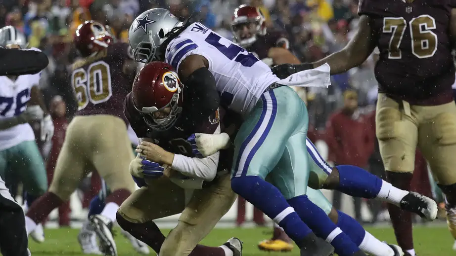 Former Dallas Cowboys linebacker Jaylon Smith sacks former Washington Redskins quarterback Kirk Cousins during the fourth quarter