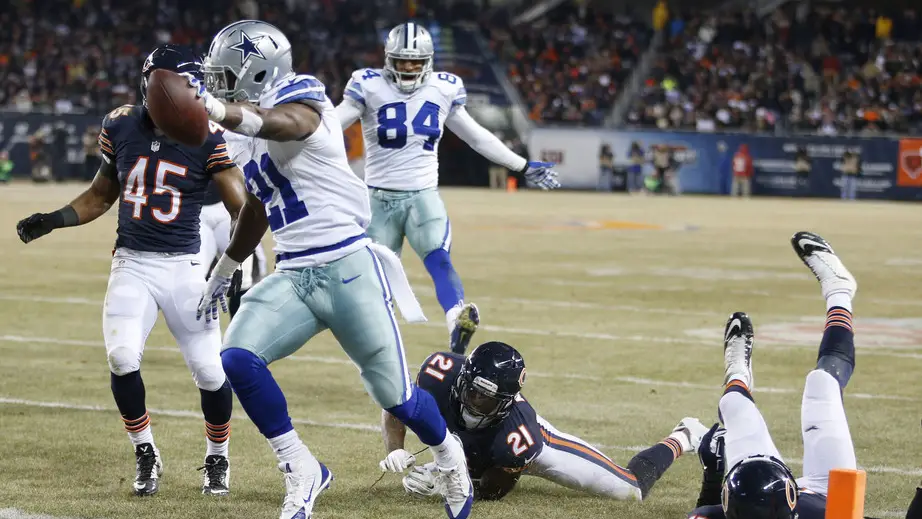 Former Dallas Cowboys running back Joseph Randle scores a touchdown against the Chicago Bears during the third quarter at Soldier Field 