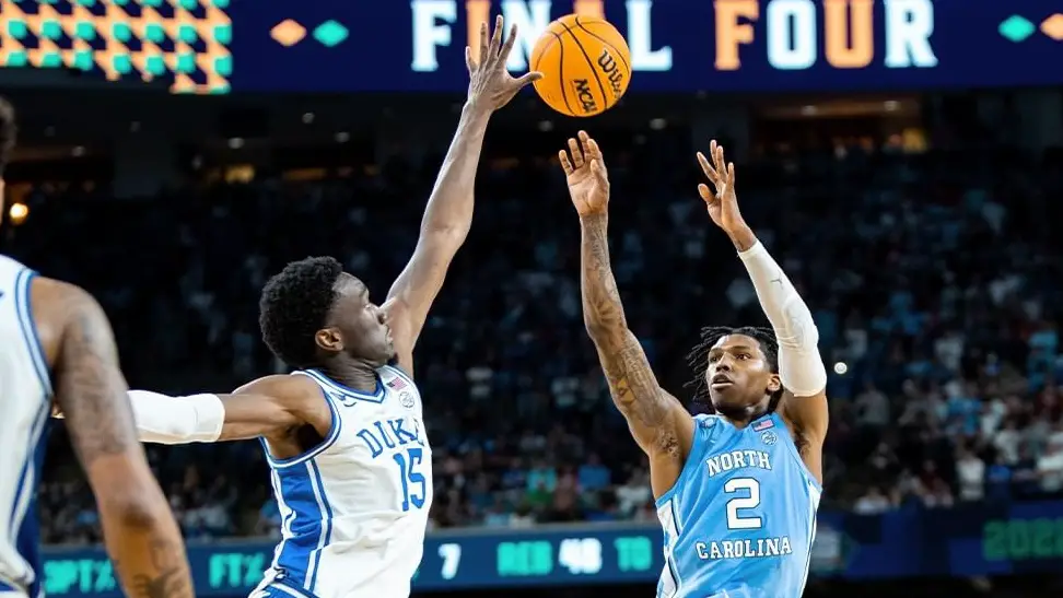 North Carolina Tar Heels guard Caleb Love makes a gut-wrenching shot to put the Tar Heels up against the Duke Blue Devils in the Final Four