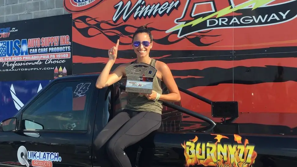 Sportsman drag racer Taylor Iacono is seen here celebrating a win at her home track at Atco Dragway