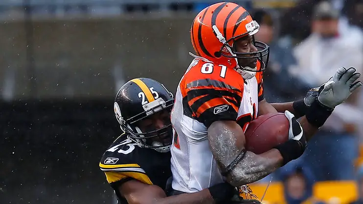 Cincinnati Bengals wide receiver Terrell Owens makes a reception in front of Ryan Clark against the Pittsburgh Steelers