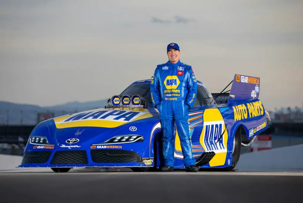 Ron Capps Motorsports driver Ron Capps stands next to his new Toyota GR Supra body that he will debut at the 4-Wide Nationals at zMAX Dragway