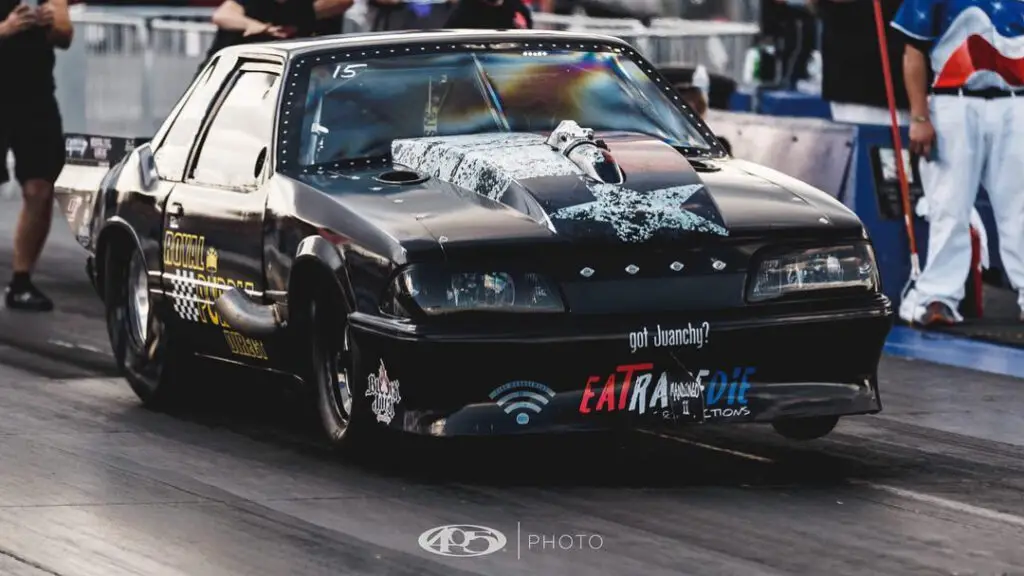 Street Outlaws No Prep Kings competitor Mike Murillo doing a burnout at an event